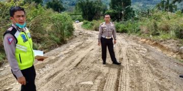 Titik ruas jalan Parapat di lintas alternatif, Simpang Palang - Simpang Sitahoan, Kecamatan Girsang Sipangan Bolon, Kabupaten Simalungun yang belum beraspal. (FOTO ANTARA/HO)