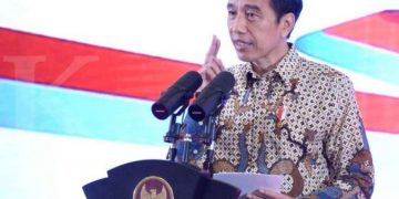 ILUSTRASI. Jokowi tegaskan tak hanya peserta BPJS yang dapat vaksin Covid-19